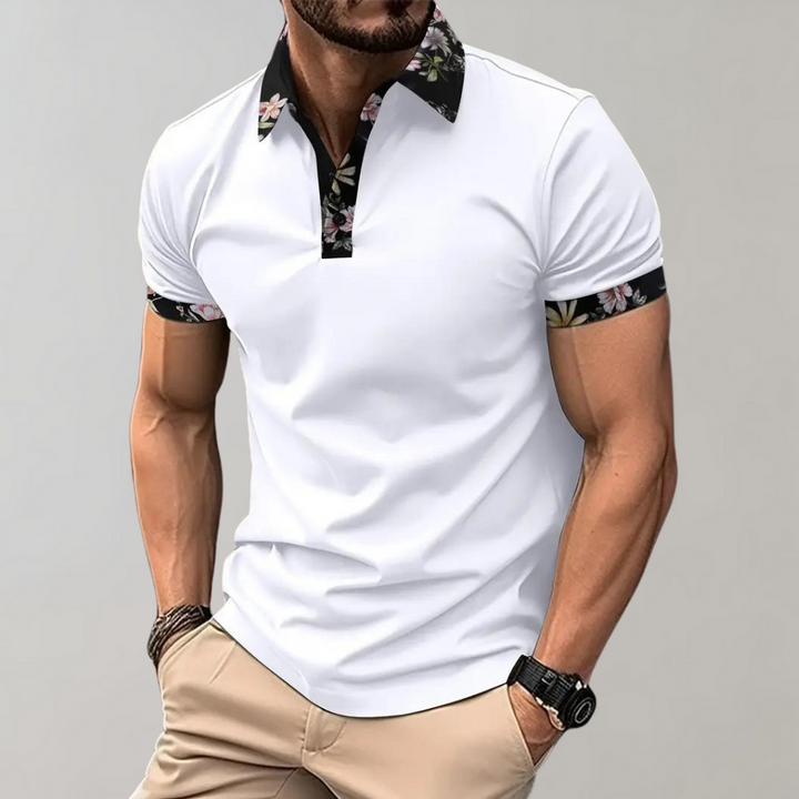 Timeless men's cotton polo, soft fabric, detailed with a subtle and stylish floral trim.
