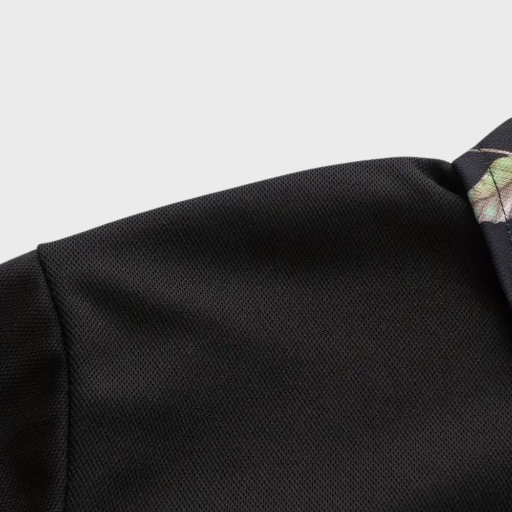 Versatile men's cotton polo shirt with a refined floral trim, great for summer or everyday wear.