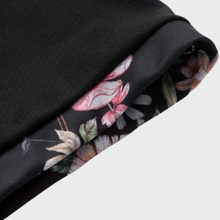 Comfortable men's classic cotton polo, short sleeve, with unique subtle floral accents.