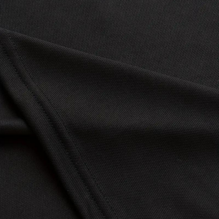 Smart casual men's cotton polo, floral trim detail, perfect for a sophisticated summer look.