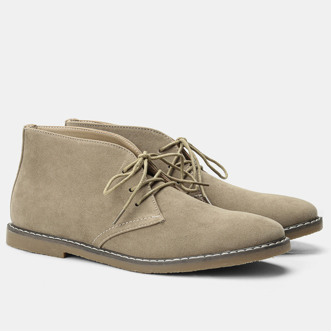 Timeless men's desert boots, combining classic style with comfortable design, suitable for all seasons.