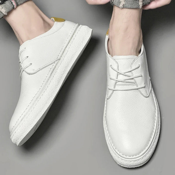 Classic men's genuine leather oxford shoes, perfect for formal and business attire.