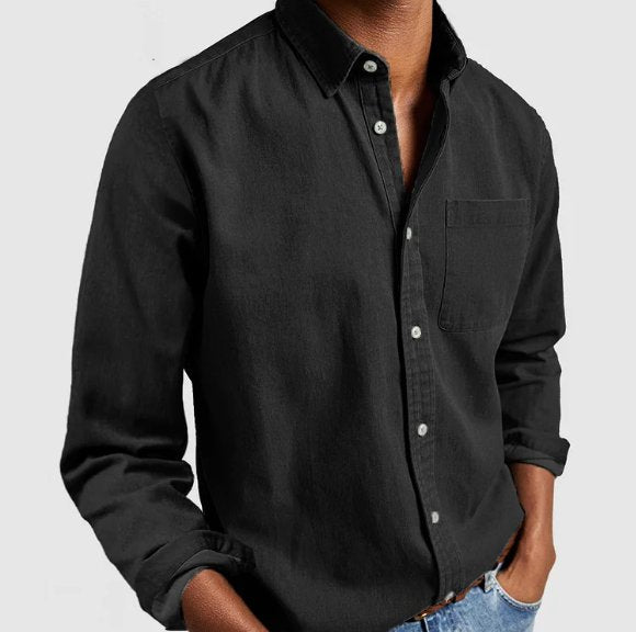 Man models a classic long sleeve button-up shirt, showcasing a smart casual, everyday look.