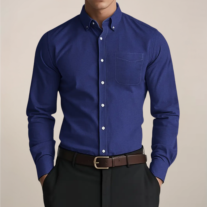 Men's classic long sleeve button-up shirt, a staple for versatile men's fashion. Smart casual elegance.