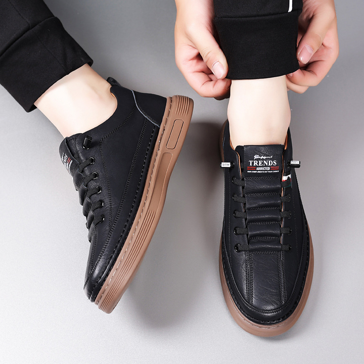 Durable men's casual low-top sneakers. Comfortable, versatile lace-up everyday footwear for modern men.