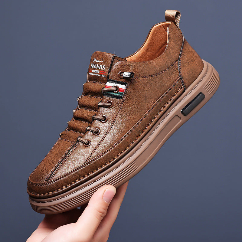 Comfortable men's low-top casual walking shoes. Stylish everyday footwear in classic brown, white & black.