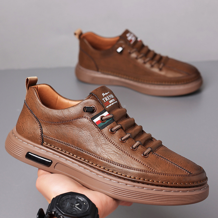 Stylish men's low-top casual sneakers. Versatile lace-up everyday footwear for men's fashion in multiple colors.