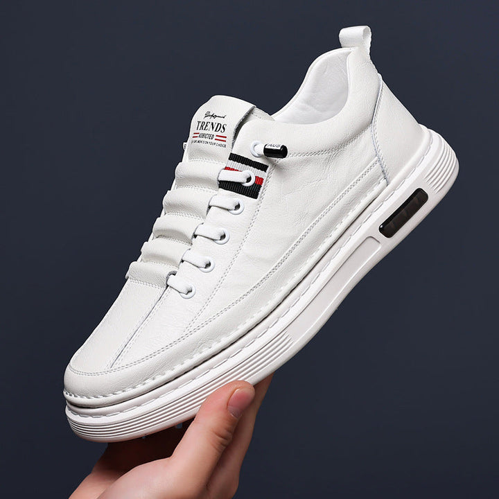 Men's brown, white & black low-top casual sneakers. Comfortable and stylish lace-up everyday walking shoes.