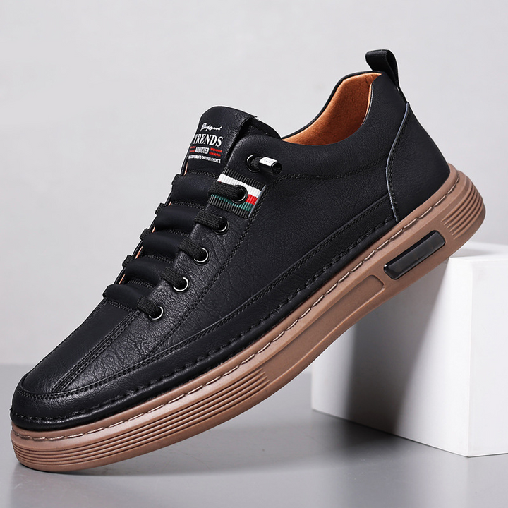Men's comfortable low-top walking sneakers. Fashionable lace-up casual shoes in classic brown, white & black.