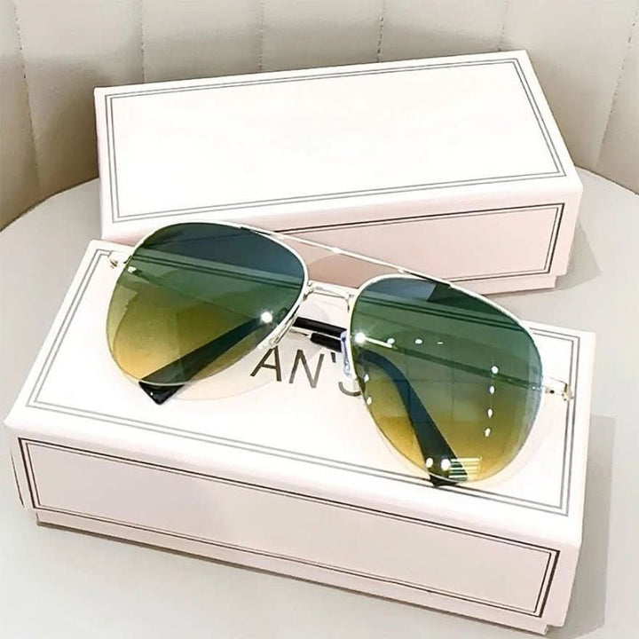 Iconic men's pilot sunglasses with UV400 sun protection. Gradient lenses add a modern, stylish touch.