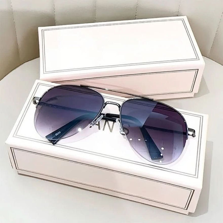 Durable men's pilot sunglasses for sports & travel. Features UV400 sun protection & gradient lenses.