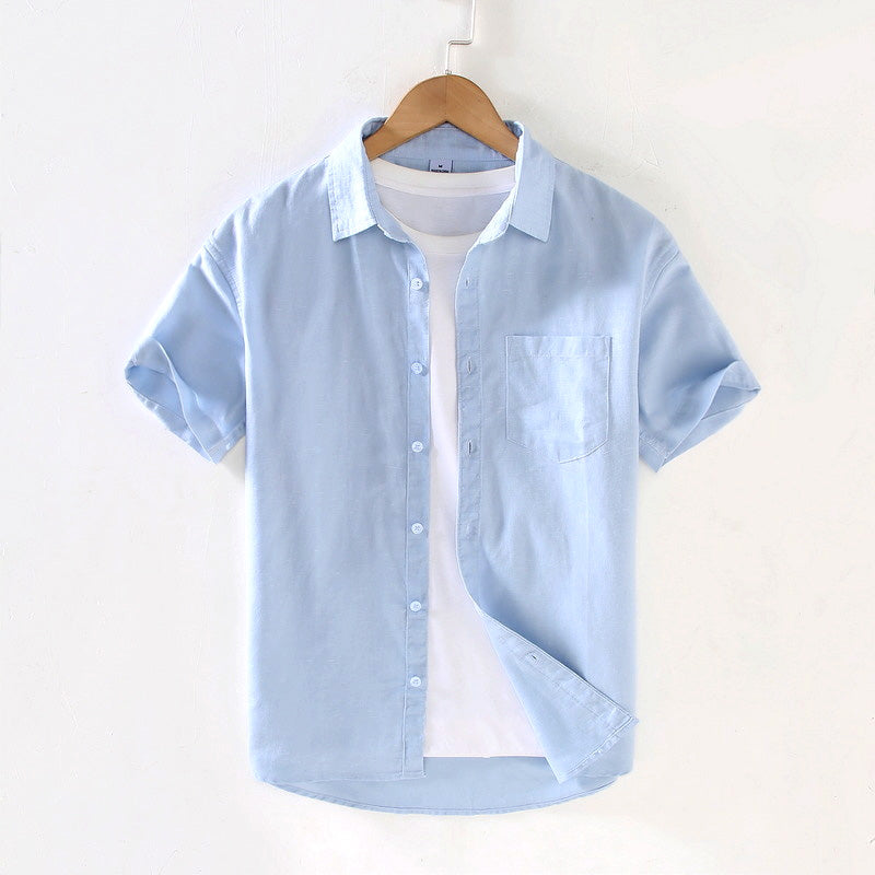 Classic men's short sleeve button-up shirt in breathable fabric, perfect for casual summer wear & everyday fashion.
