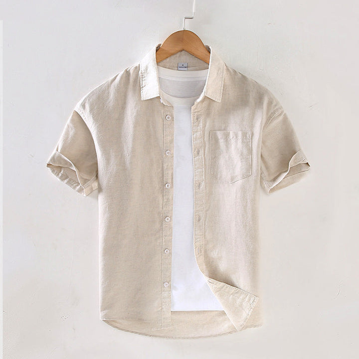 Lightweight men's short sleeve button-up shirt for smart casual occasions. Breathable summer top for men.