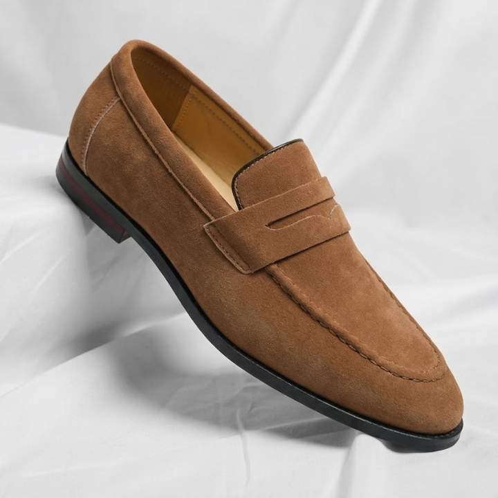 Classic men's slip-on leather penny loafers for a timeless, versatile style. Perfect for casual or dress wear.