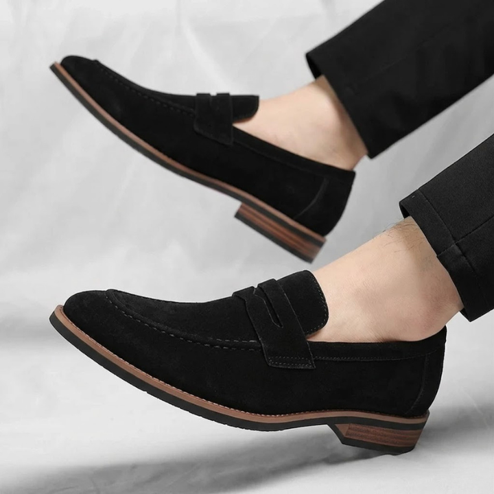 High-quality men's slip-on loafers, classic penny style ideal for business casual or everyday fashion.