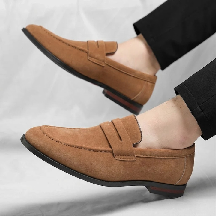 Comfortable men's leather slip-on penny loafers, ideal for everyday casual wear & dressy occasions.