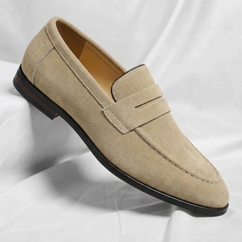 Elegant men's slip-on penny loafers, a classic dress shoe for sophisticated men's fashion.
