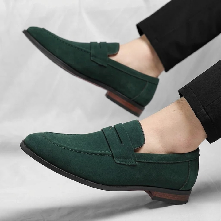Durable men's leather penny loafers, designed as comfortable slip-on dress shoes for modern men.