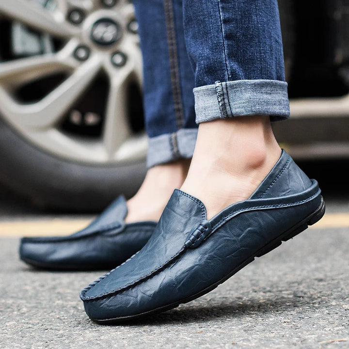 Versatile men's dress shoes: black slip-on loafers for style & comfort.