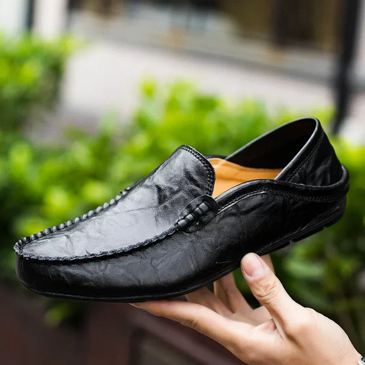 Comfortable men's slip-on loafers in premium leather, ideal for daily wear & business casual.