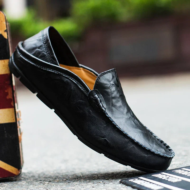 Durable men's dress loafers, classic slip-on design offering all-day comfort & elegance.