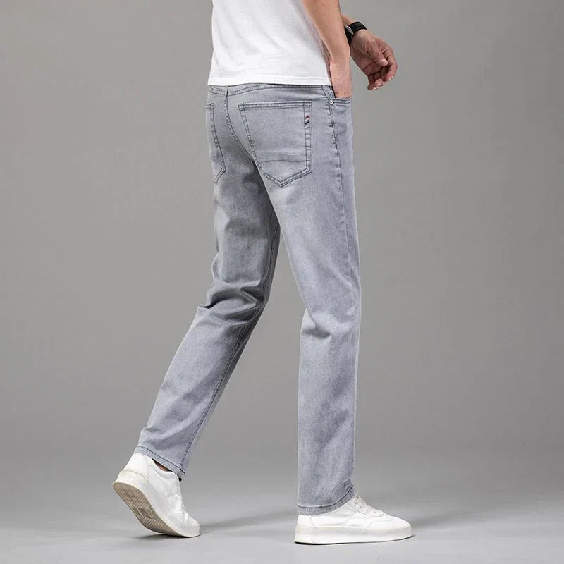 Stylish men's straight fit denim jeans with stretch fabric, ideal for modern mens fashion and daily casual wear.