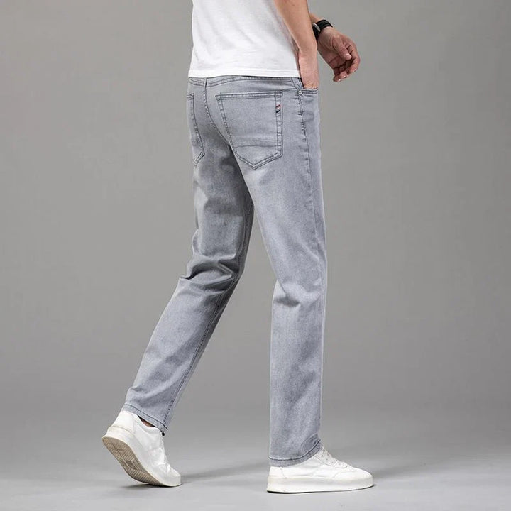 Stylish men's straight fit denim jeans with stretch fabric, ideal for modern mens fashion and daily casual wear.