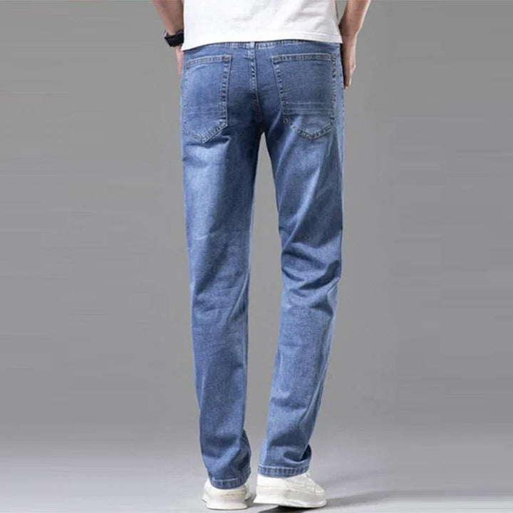 Everyday men's straight fit stretch denim jeans, providing comfort and style for various casual fashion looks.