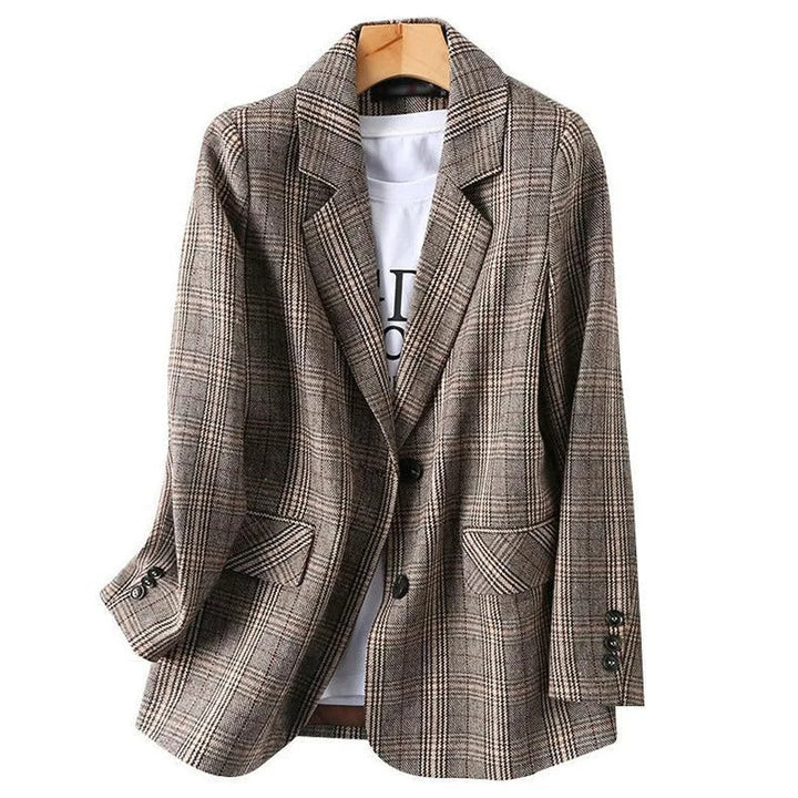 Sharp men's classic plaid tailored blazer jacket, ideal for a sophisticated business or smart casual outfit.