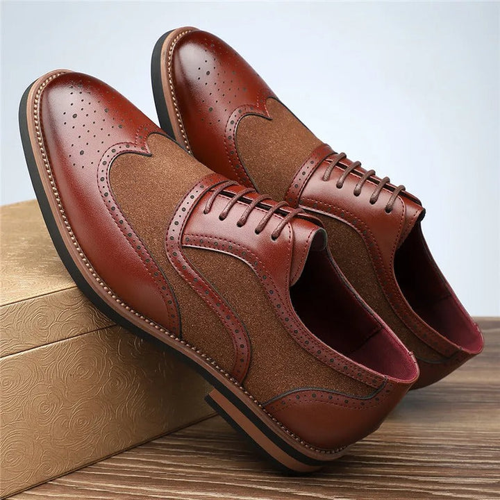 Fashionable men's two-tone brogue oxfords, ideal dress shoes for a sharp, modern outfit.