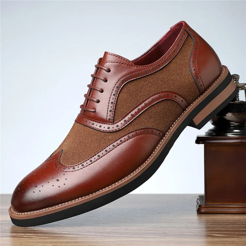 Detailed view of men's two-tone brogue oxfords, featuring classic wingtip design and fine leather.