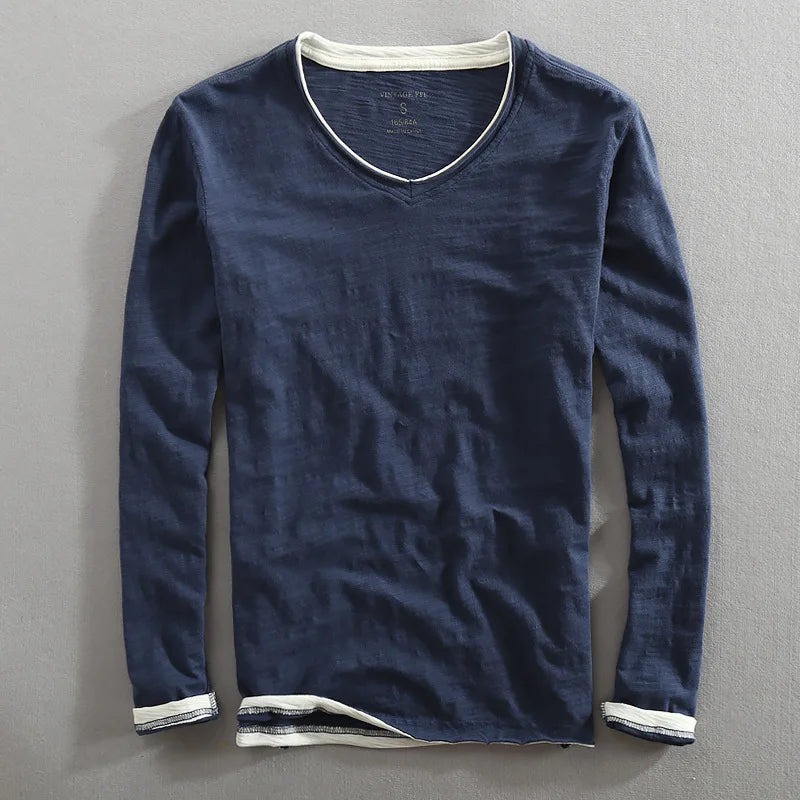 Classic men's V-neck shirt in soft fabric, perfect for everyday comfortable casual wear.