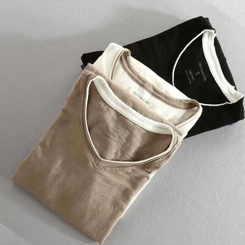 Relaxed fit men's V-neck shirt, a comfortable basic tee staple for summer and everyday casual wear.