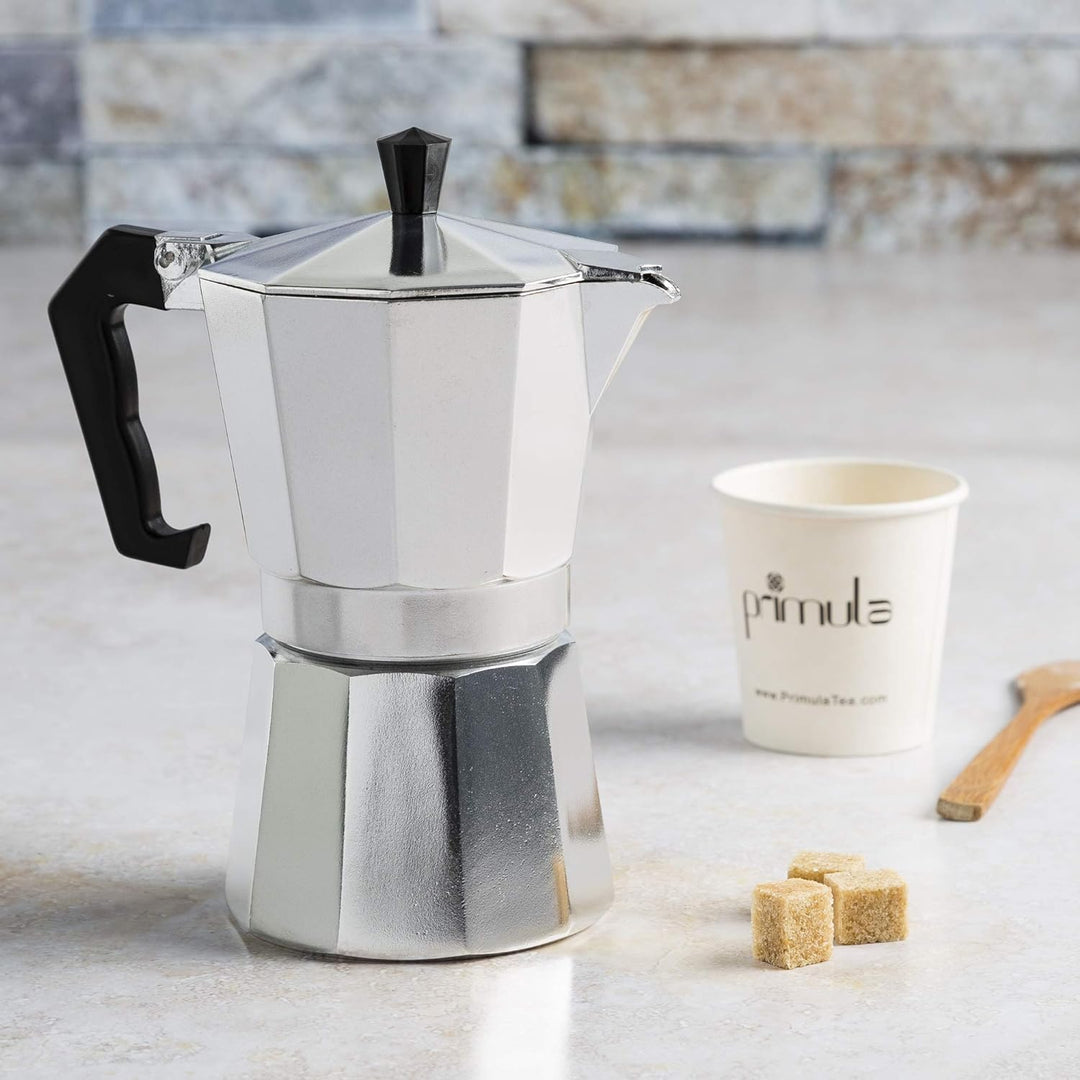 Elegant Moka Pot espresso machine, a timeless brewing device for savoring rich Italian coffee & morning rituals.