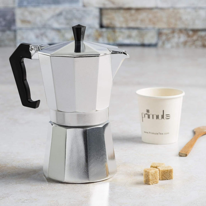 Elegant Moka Pot espresso machine, a timeless brewing device for savoring rich Italian coffee & morning rituals.