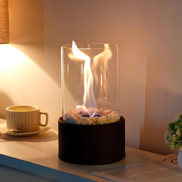 Decorative Lumora oil lamp, open flame design, clear glass reservoir and metallic base for classic lighting.