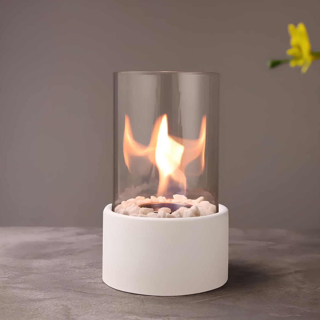 Lumora decorative table lamp, a classic open flame oil lantern in metal and glass, for ambient light.