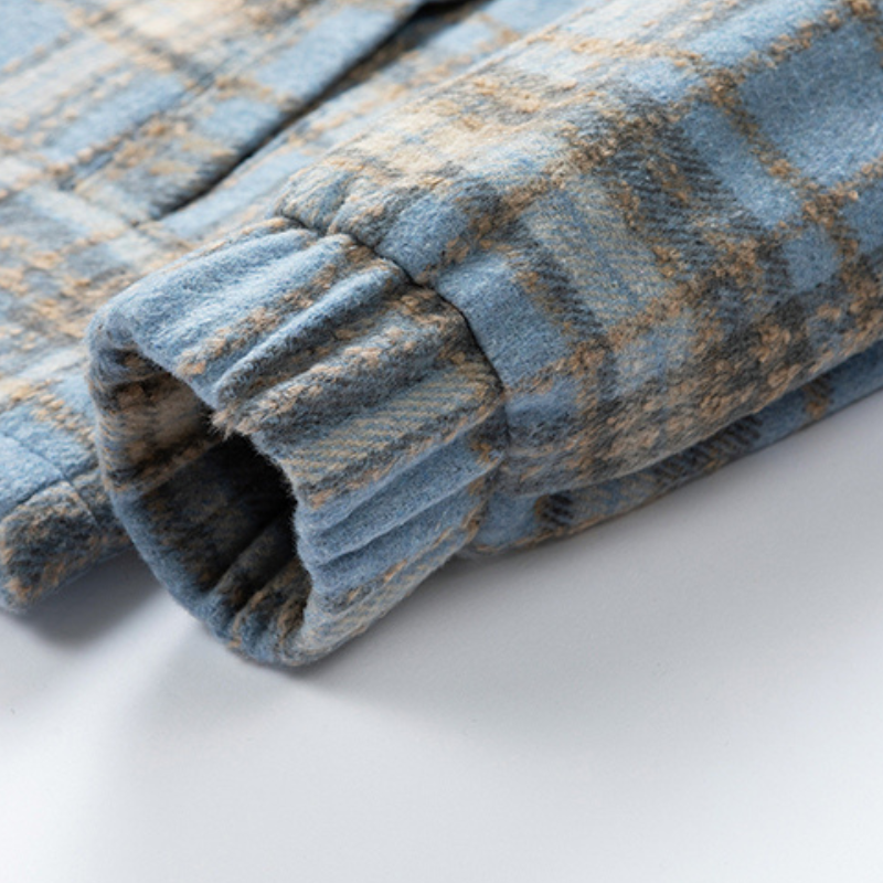 Cozy unisex plaid winter jacket with a classic collar, perfect for cold weather style.
