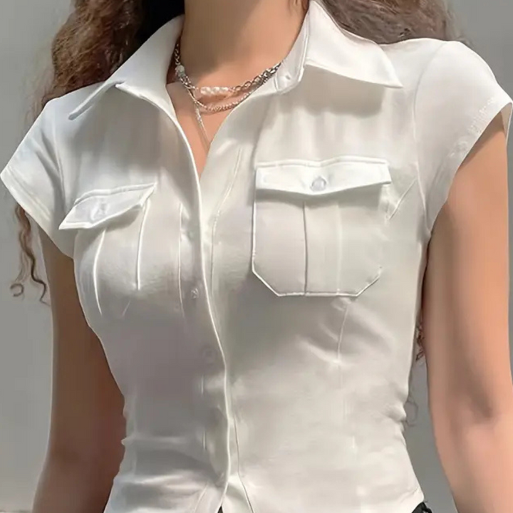 Timeless white button-up blouse for women, a versatile long sleeve top ideal for professional workwear.