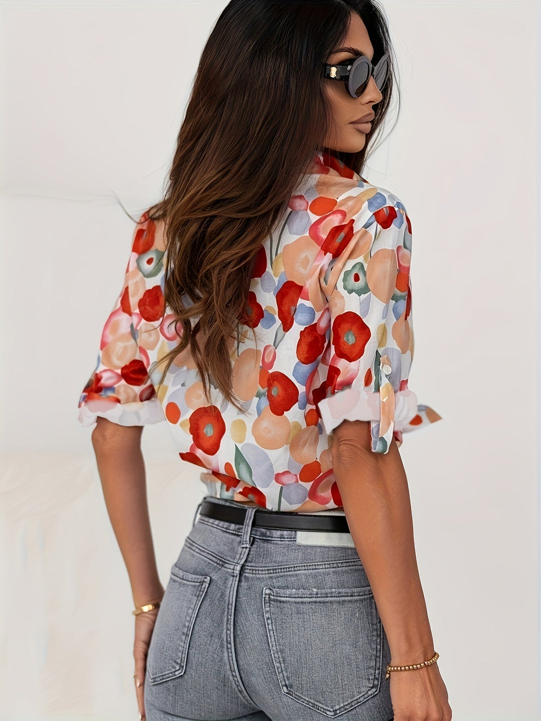 Versatile women's long sleeve blouse in a classic collared style, ideal for sophisticated workwear or casual comfort.