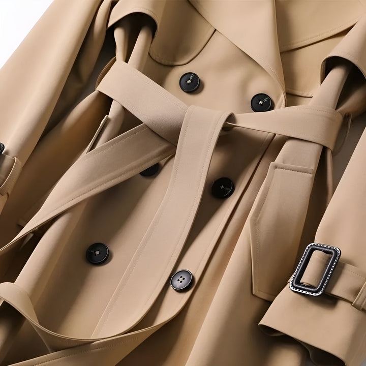Versatile women's double-breasted trench coat with belt, chic water-resistant outerwear for spring & fall.