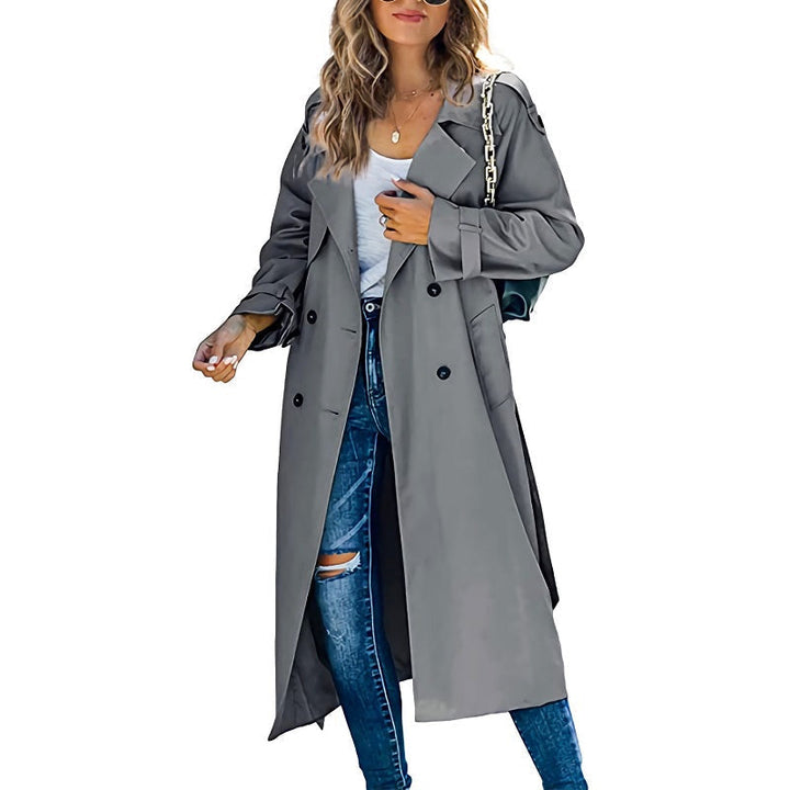 Women's classic double-breasted trench coat with belt, elegant long jacket for timeless fall fashion.