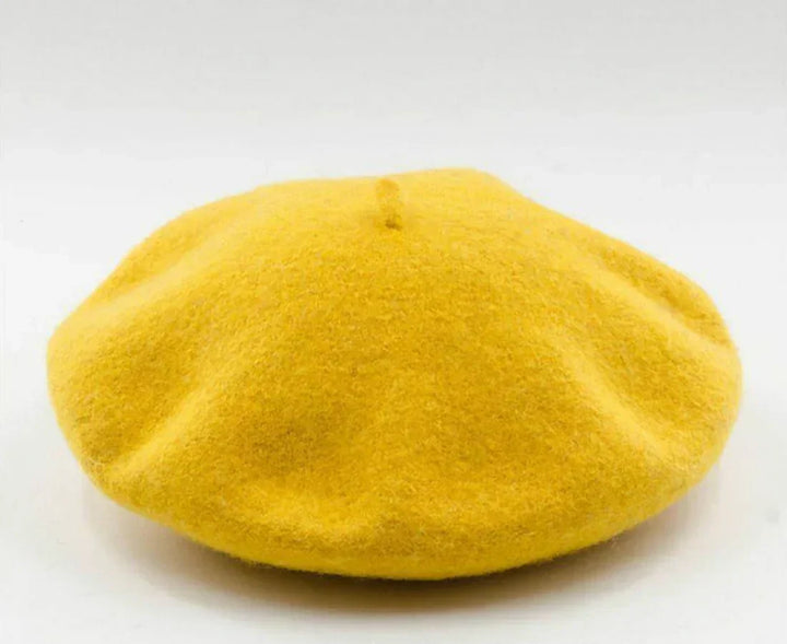 Elegant women's classic beret, perfect for winter. Chic and warm headwear for fashion lovers.