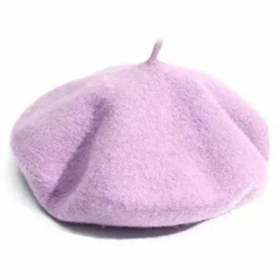 Warm women's beret, a classic fashion hat. Perfect for stylish cold weather protection.