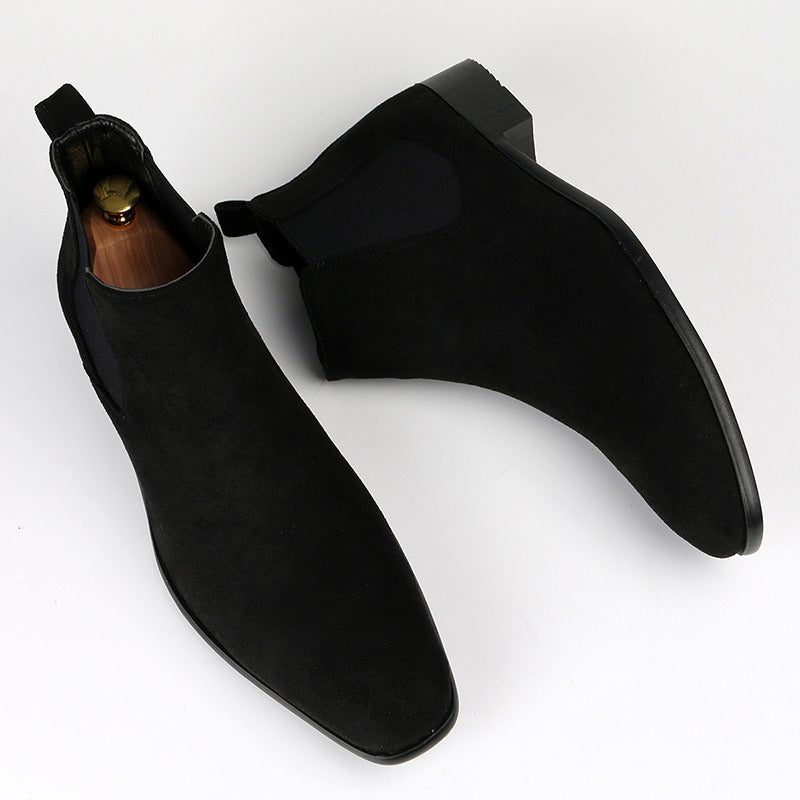 Women's fashion Chelsea boots with a contemporary block heel. Comfortable slip-on ankle boots for fall style.
