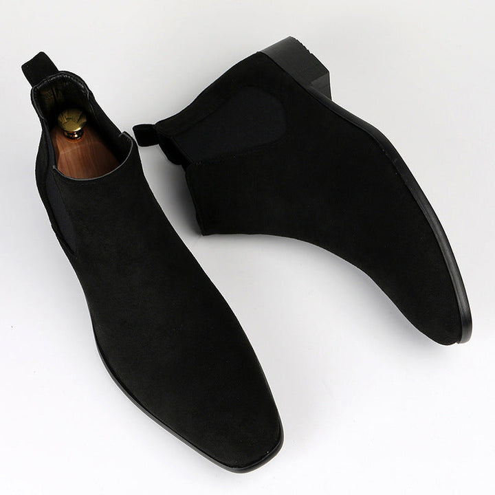 Women's fashion Chelsea boots with a contemporary block heel. Comfortable slip-on ankle boots for fall style.