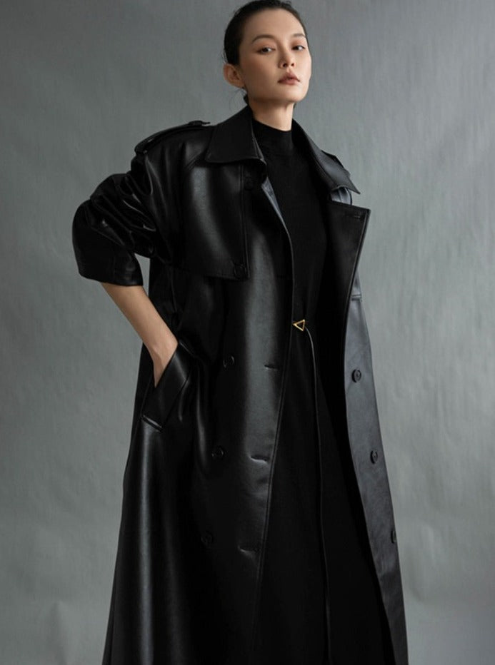 Chic women's long trench coat with an oversized fit. Perfect stylish layer for fall fashion.