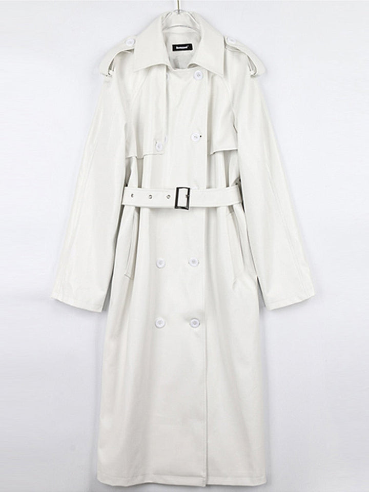 Fashionable women's trench coat. A stylish, long coat for a chic, layered look. Fall/winter essential.