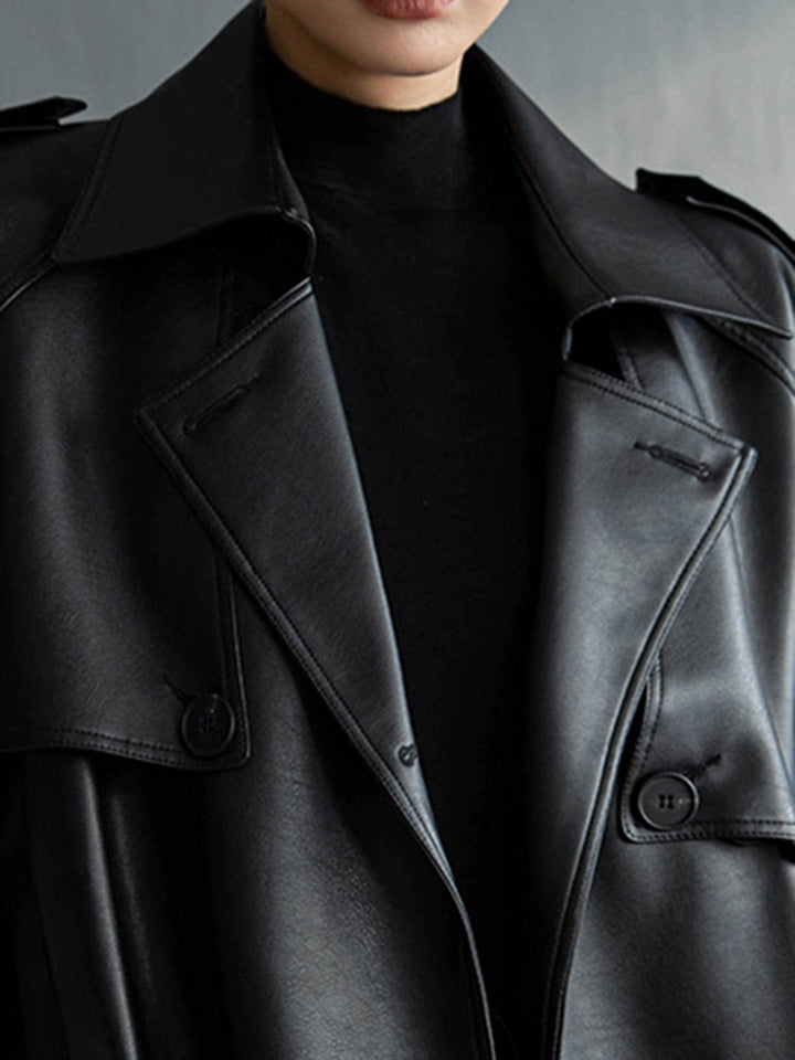 Oversized fit women's trench coat, offering chic style and warmth for cooler weather.
