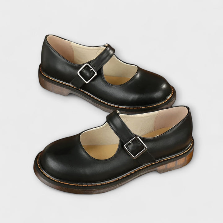 Women's classic Mary Jane shoes featuring an adjustable buckle. Stylish, comfortable flats for everyday casual wear.